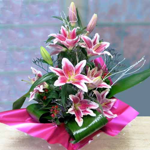 Pink Lily In A Basket-Cheap Flower Arrangements Delivery